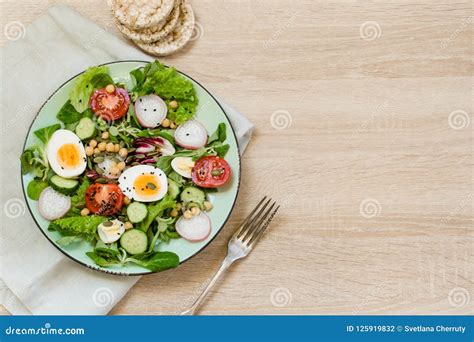 Fresh Salad With Vegetables And Eggs For Proper Nutrition Top View