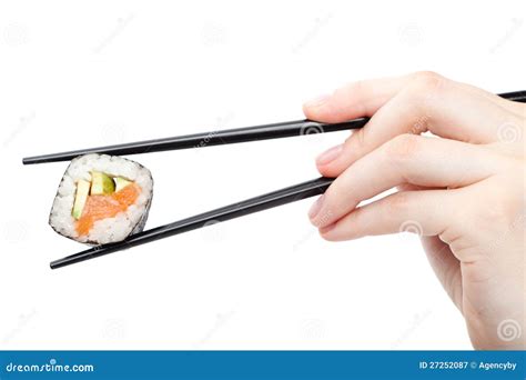 Hand Holding Sushi Roll With Black Chopsticks Royalty Free Stock Photography Image 27252087