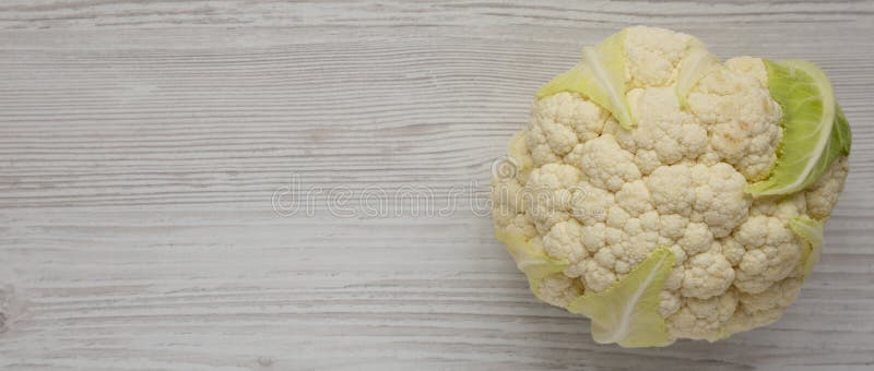 Raw Cauliflower Head And Floret With Nutritional Fact Label On W Stock