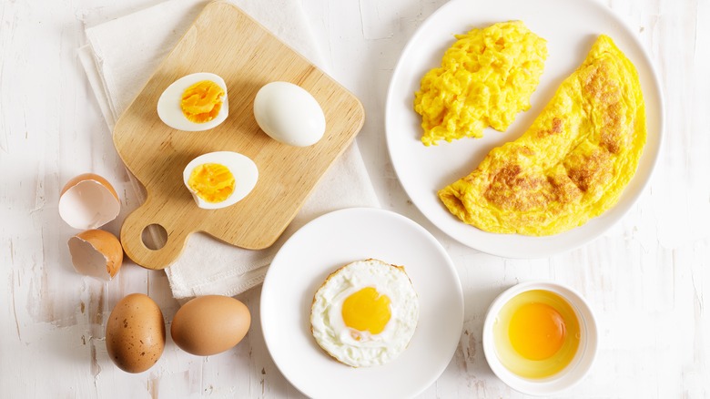 The Cooking Method That Makes Shirred And Scrambled Eggs Different